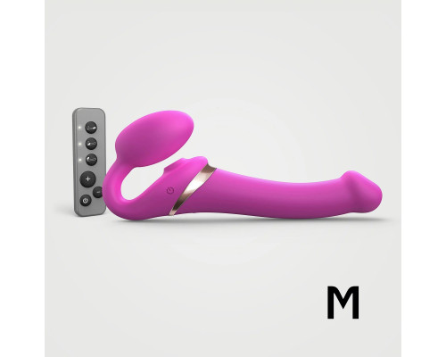 Заказать Ярко-розовый безремневой страпон Multi Orgasm Size M с клиторальной стимуляцией