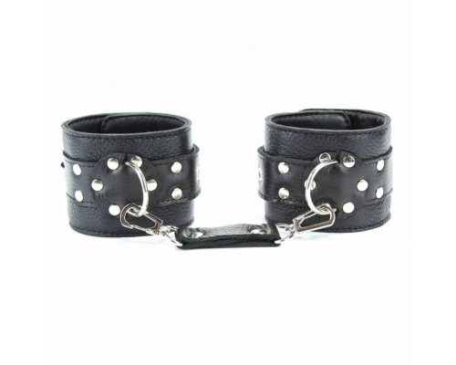 Заказать Чёрные наручники из кожи с пряжками
