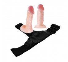 Женский страпон с двумя сменными насадками - 10,5 и 10 см.